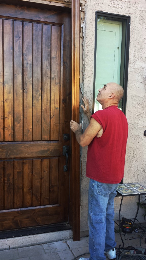 Installing a new custom knotty alder door 
