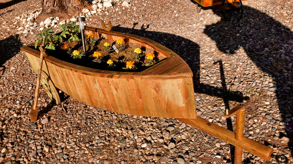 Boat flower bed on wheels