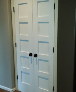 Replacing interior hollow core doors with solid Shaker style doors.