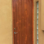 Termite damaged knotty alder door jamb, replaced with custom new jamb