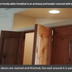 Custom design bi-fold knotty alder doors